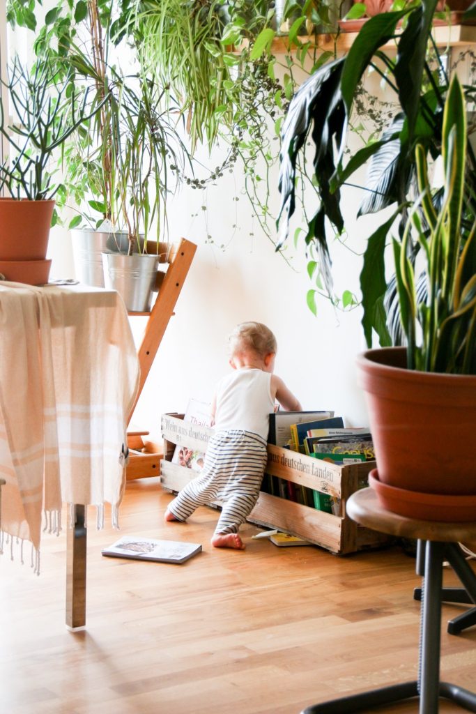 Toddler with books