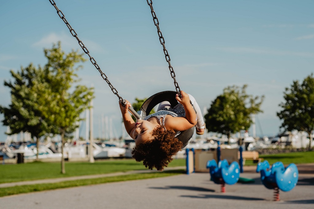 toddler in outdoor wing